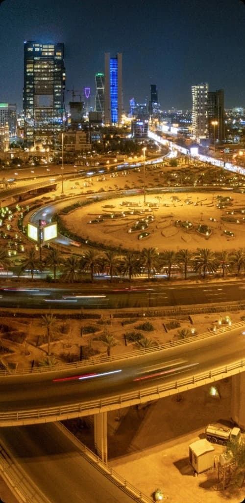 Aerial night view of urban mobility and interconnected infrastructure